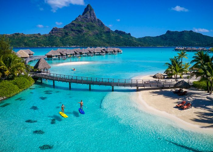 two people paddleboarding InterContinental Bora Bora Resort & Thalasso Spa