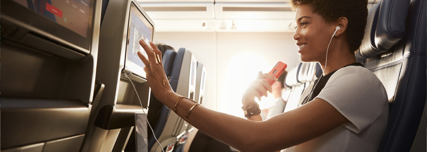 woman sitting in Delta Comfort+