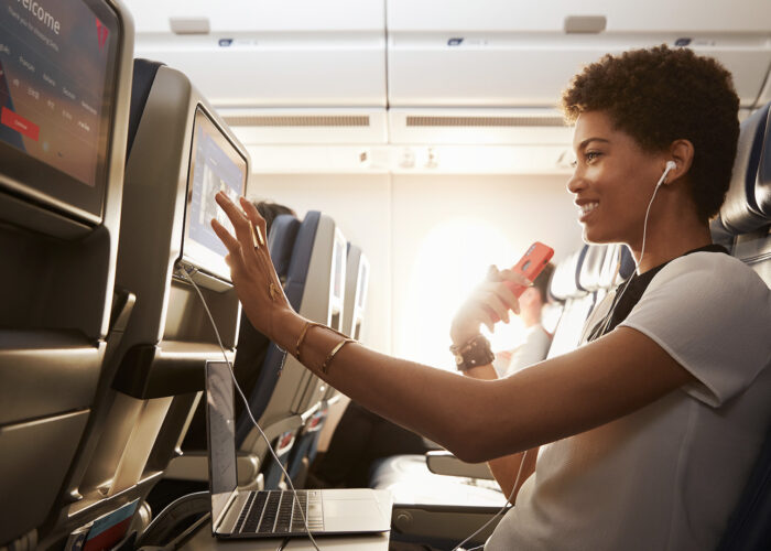 woman sitting in Delta Comfort+